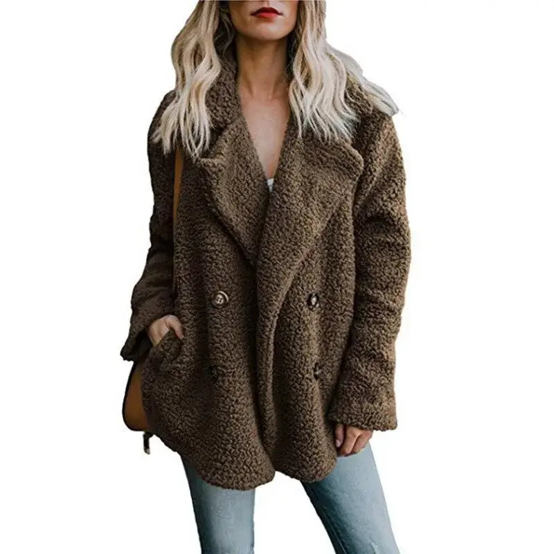 Stylish woman wearing a brown fur winter coat, perfect for staying warm and fashionable in cold weather.