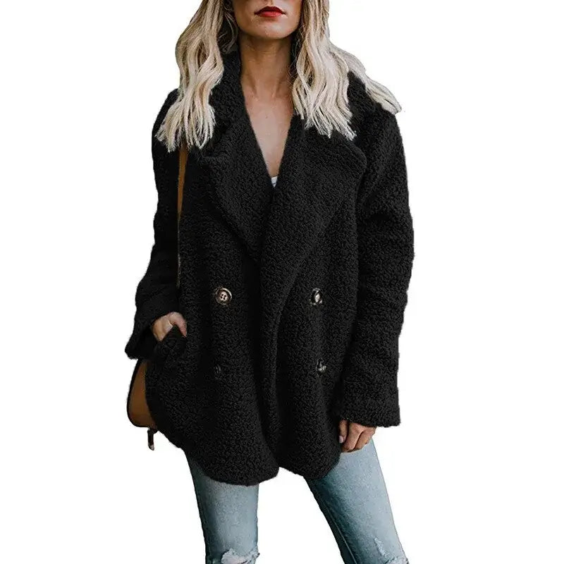 Stylish woman in a black fur winter coat, showcasing warmth and elegance for the cold season. Perfect for winter outfits.