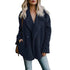 Stylish woman in a cozy navy fur winter coat, showcasing elegance and warmth for cold weather fashion.